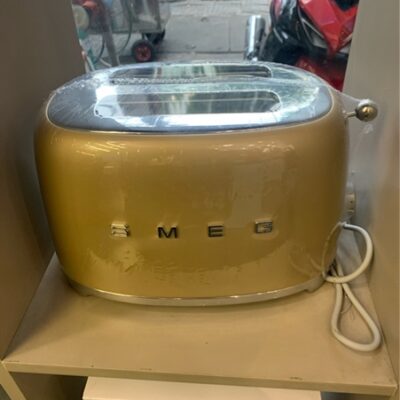 Máy nướng bánh mì Smeg TSF01CHMEU mầu đồng nhám